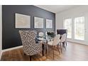 Contemporary dining room featuring stylish chairs, modern table, and elegant decor at 2427 Bayberry St, Acworth, GA 30101