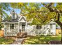 Charming two-story home with landscaped yard and inviting brick stairs to the front door at 1471 Hardin Ave, College Park, GA 30337