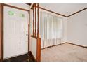 Bright foyer with slate tile flooring and decorative wood trim accents at 1184 Alemeda Dr, Marietta, GA 30066
