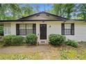 Inviting front entrance with a well-manicured lawn and charming curb appeal at 1184 Alemeda Dr, Marietta, GA 30066