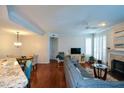 Open concept living room with hardwood floors and bright lighting at 1315 Mcgill Park Ne Ave, Atlanta, GA 30312