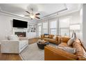 Inviting living room with fireplace, built-in shelves, and ample natural light at 4309 Elliott Way, Smyrna, GA 30082