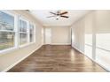 Bright living room with wood-look floors, neutral walls, and ample natural light at 1997 Columbia Dr, Decatur, GA 30032