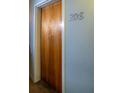 Image of the apartment door, number 208, in the condo building at 204 Walker Sw St # 208, Atlanta, GA 30313