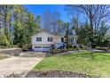 Inviting two-story home boasting a lush front lawn, attached garage, and charming curb appeal at 2426 Westland Way, Acworth, GA 30102