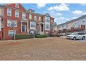 Attractive townhomes with well-kept lawns, showcasing the inviting neighborhood setting and curb appeal at 4874 Seldon Se Way, Smyrna, GA 30080