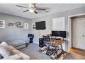 Stylized home office/bedroom includes a sofa and desk area for work or relaxing at 5545 Circlestone Ln, Stone Mountain, GA 30083