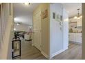 Hallway view with staircase and kitchen view at 1050 Wedgewood Ln, Tucker, GA 30084