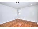 Bright bedroom featuring hardwood floors and natural light at 4212 Logan Dr, Loganville, GA 30052