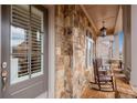 Inviting front porch with stone accents and comfortable seating at 4850 Kentwood Dr, Marietta, GA 30068