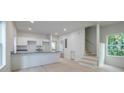 Bright, modern kitchen with white cabinets, granite countertops, and hardwood floors at 813 Smith Sw St # B, Atlanta, GA 30310