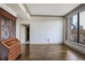 Spacious living room with large window and hardwood floors has plenty of natural light at 3445 Stratford Ne Rd # 502, Atlanta, GA 30326