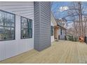 A spacious wooden deck featuring railings at 137 Creekview Dr, Woodstock, GA 30188