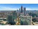 A panoramic skyline view showcasing modern high-rise buildings against a clear blue sky at 855 Peachtree Ne St # 2912, Atlanta, GA 30308