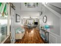 Bright foyer with hardwood floors, high ceilings, and seamless flow into the spacious living area at 5035 Foxberry Ln, Roswell, GA 30075