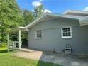 Covered back patio and well maintained lawn provide outdoor enjoyment at 3802 Macland Rd, Hiram, GA 30141