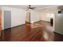 Spacious open-plan living area featuring sleek hardwood floors and plenty of natural light at 8325 Attleboro Dr, Jonesboro, GA 30238