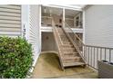 Exterior view of the condo complex, showcasing private stairwell access to upper units at 1379 Keys Lake Ne Dr, Brookhaven, GA 30319