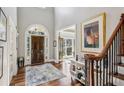 Elegant foyer with hardwood floors and a staircase at 2298 Greenglade Ne Rd, Atlanta, GA 30345