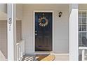 Close-up of the front door with a decorative wreath and house number 951 at 951 Orchard Mill Ln, Lawrenceville, GA 30043