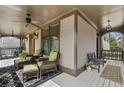 Covered front porch with comfortable seating, creating an inviting outdoor space with views to the outside at 1214 Oglethorpe Ne Ave, Brookhaven, GA 30319