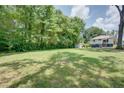 Expansive backyard offering ample green space and serene views, creating a perfect outdoor retreat at 1742 Ware Ave, Atlanta, GA 30344