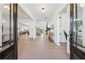 Spacious foyer with hardwood floors and an open floor plan at 7560 Wild Violet Dr, Cumming, GA 30040