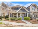 Beautiful craftsman-style home featuring a covered porch, trimmed landscaping, and inviting curb appeal at 196 Wingo St, Norcross, GA 30071