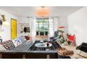 Bright living room with contemporary decor and window at 1190 Briarcliff Ne Rd # 1, Atlanta, GA 30306