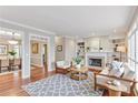 Inviting living room featuring built-in bookshelves, a fireplace, and hardwood floors at 2515 Oak Quarters, Smyrna, GA 30080