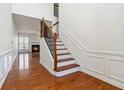 Bright foyer with hardwood floors and a staircase leading to the upper level at 5729 Evadale Trce # 6, Mableton, GA 30126