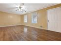 Spacious living room with hardwood floors, neutral walls, and natural light at 2670 Foxlair Trl, Atlanta, GA 30349