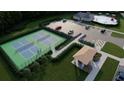 Aerial view of community amenities including tennis courts, pool, and clubhouse at 209 Groveton Ct, Euharlee, GA 30145