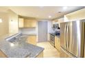 Modern kitchen with stainless steel appliances and granite countertops at 390 17Th Nw St # 2024, Atlanta, GA 30363