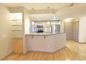 Kitchen offers a breakfast bar, stainless appliances and a view to the living area at 390 17Th Nw St # 2024, Atlanta, GA 30363