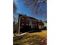 Charming two-story brick home with a well-manicured lawn and a two-car garage at 136 Hunters Ct, Dallas, GA 30157