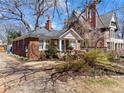 Lovely brick home with a cozy front porch and well-maintained landscaping at 902 Edgewood Ne Ave, Atlanta, GA 30307