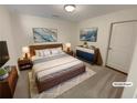Comfortable bedroom with soft carpet, a queen-sized bed, and contemporary decor at 272 Laurel Canyon Pkwy, Canton, GA 30114