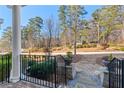 View of the front yard from the porch showing stone walkway and manicured lawn at 261 Thompson St, Alpharetta, GA 30009