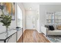 Welcoming entryway features wood floors and stylish decor leading to a living space at 260 Westview Sw Pl, Atlanta, GA 30314