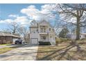 Two-story home with a double porch, complemented by a well-maintained lawn at 260 Westview Sw Pl, Atlanta, GA 30314