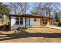 Charming single-story home featuring a modern brick facade, updated siding, and a well-manicured front yard at 1244 Lorenzo Sw Dr, Atlanta, GA 30310