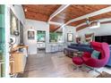 Bright, open concept living room with beautiful wood ceiling and trim at 3398 Lori Ln, Atlanta, GA 30340