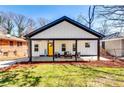 Beautifully renovated home featuring a welcoming front porch with outdoor seating at 236 Barfield Sw Ave, Atlanta, GA 30310