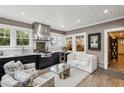 Beautifully designed outdoor kitchen featuring a stainless steel range, ample seating, and stylish finishes at 1666 Johnson Ne Rd, Atlanta, GA 30306