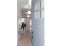 Bright entryway featuring hardwood floors, modern lighting, and open access to the living spaces at 496 Federal Se Ter, Atlanta, GA 30315