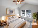 Cozy bedroom features a vaulted ceiling and natural light from the window at 755 Autumn Blfs, Fairburn, GA 30213