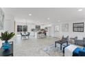 Open-concept living area with modern decor, hardwood floors, and natural light at 1066 Cleavemark Dr, Clarkston, GA 30021