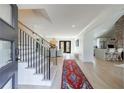 Inviting foyer with hardwood floors and a staircase at 1110 Vernon Springs Ct, Atlanta, GA 30327