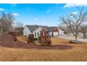 View of a single-story home with brick and siding, attached two-car garage, on a grassy lot at 1760 Campbell Ives Dr, Lawrenceville, GA 30045
